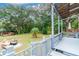 Relaxing deck overlooking a lush backyard and water view at 1905 E Mulberry Dr # 2, Tampa, FL 33604