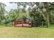 Wooden deck overlooking a serene waterway, nestled in a natural setting at 1905 E Mulberry Dr # 2, Tampa, FL 33604