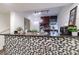 Modern kitchen with granite countertops and a breakfast bar at 1905 E Mulberry Dr # 2, Tampa, FL 33604