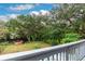 Deck overlooks the backyard, leading to a tranquil waterfront at 1905 E Mulberry Dr # 2, Tampa, FL 33604