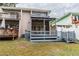 Two-story home with a spacious deck and lush landscaping at 1905 E Mulberry Dr # 2, Tampa, FL 33604