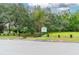 Entrance to River Cove Park with lush greenery at 1905 E Mulberry Dr # 2, Tampa, FL 33604
