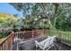 Wooden deck with wicker chair and river view at 1905 E Mulberry Dr # 1, Tampa, FL 33604