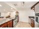 Kitchen boasts granite countertops and stainless steel appliances at 1905 E Mulberry Dr # 1, Tampa, FL 33604