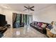Living room with sliding doors leading to backyard at 1905 E Mulberry Dr # 1, Tampa, FL 33604
