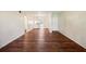 Spacious living room featuring hardwood floors at 7585 Abonado Rd, Tampa, FL 33615