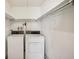 Laundry room with washer and dryer at 7585 Abonado Rd, Tampa, FL 33615