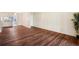 Living room with hardwood floors and access to backyard at 7585 Abonado Rd, Tampa, FL 33615