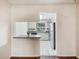 Kitchen with stainless steel appliances and breakfast bar at 7585 Abonado Rd, Tampa, FL 33615