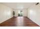 Spacious living room with wood floors and patio access at 7585 Abonado Rd, Tampa, FL 33615