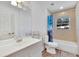 Clean bathroom with a shower/tub combo and vanity at 1404 E Frances Ave, Plant City, FL 33563