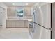 Modern kitchen with stainless steel appliances and granite countertops at 1404 E Frances Ave, Plant City, FL 33563