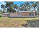 Ranch style home with a large yard and shed at 1404 E Frances Ave, Plant City, FL 33563