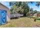 Large backyard with a shed and privacy fence at 1404 E Frances Ave, Plant City, FL 33563