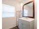 Bathroom with vanity and a large mirror at 1404 E Frances Ave, Plant City, FL 33563