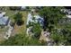 House with large backyard surrounded by trees at 1404 E Frances Ave, Plant City, FL 33563