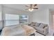Bedroom with a couch and large window, offering natural light at 1404 E Frances Ave, Plant City, FL 33563