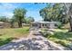 Ranch style home with a large yard at 1404 E Frances Ave, Plant City, FL 33563