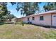 Large backyard with a shed and fire pit at 1404 E Frances Ave, Plant City, FL 33563