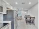 Modern kitchen with stainless steel appliances and granite countertops at 1404 E Frances Ave, Plant City, FL 33563