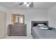 Bedroom featuring a double bed, dresser and ceiling fan at 1404 E Frances Ave, Plant City, FL 33563