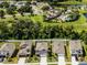 Community view with pool and homes at 6267 Back Forty Loop, Zephyrhills, FL 33541