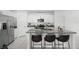 Modern kitchen featuring granite island, stainless steel appliances at 6267 Back Forty Loop, Zephyrhills, FL 33541