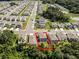 Wide aerial view showing home and neighborhood at 6267 Back Forty Loop, Zephyrhills, FL 33541