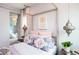 Spacious bedroom with canopy bed and en-suite bathroom at 16227 Alpha Grove Pl, Odessa, FL 33556