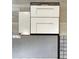 New Haven kitchen design featuring white cabinets, quartz countertops, and gray tile at 16227 Alpha Grove Pl, Odessa, FL 33556