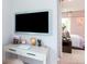 Bright study with built-in desk and view of bedroom at 16227 Alpha Grove Pl, Odessa, FL 33556