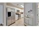 Kitchen with stainless steel appliances and white cabinets at 7615 Alhambra Dr, Bradenton, FL 34209