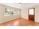Spacious bedroom with a door leading to the backyard at 5824 11Th St, Zephyrhills, FL 33542