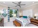 Bedroom with a comfy bed, window, and wooden nightstands at 16224 Alpha Grove Pl, Odessa, FL 33556