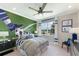 Youth bedroom with soccer-themed wall mural and built-ins at 16224 Alpha Grove Pl, Odessa, FL 33556