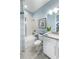Light and airy bathroom with a tub shower combination at 16224 Alpha Grove Pl, Odessa, FL 33556