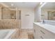 Bathroom with garden tub and separate shower at 8514 Zapota Way, Tampa, FL 33647