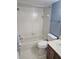 Clean bathroom with tub and wood vanity at 6322 Palma Del Mar S Blvd # 215, St Petersburg, FL 33715