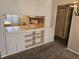 Open kitchen with pass-through to dining area at 6322 Palma Del Mar S Blvd # 215, St Petersburg, FL 33715
