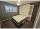 Bedroom with a wall bed and built-in shelving at 6322 Palma Del Mar S Blvd # 215, St Petersburg, FL 33715