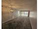 Living room with sliding doors to balcony at 6322 Palma Del Mar S Blvd # 215, St Petersburg, FL 33715