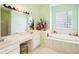 Bathroom boasts a double vanity and a large garden tub at 289 Dandelion Ct, Spring Hill, FL 34606