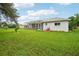 House with screened porch and large backyard at 289 Dandelion Ct, Spring Hill, FL 34606
