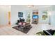 Bright living room featuring tile floors and large windows at 289 Dandelion Ct, Spring Hill, FL 34606