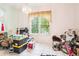 Dining room with window and chandelier, currently cluttered at 289 Dandelion Ct, Spring Hill, FL 34606