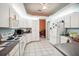 Spacious kitchen featuring ample cabinetry and a convenient island at 289 Dandelion Ct, Spring Hill, FL 34606