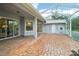 Screened patio with brick pavers, great for outdoor living at 289 Dandelion Ct, Spring Hill, FL 34606