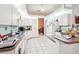 White kitchen with ample counter space and appliances at 289 Dandelion Ct, Spring Hill, FL 34606