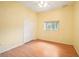 Simple bedroom with wood flooring and double door closet at 289 Dandelion Ct, Spring Hill, FL 34606
