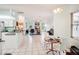 Kitchen with a breakfast bar and a view of the dining area at 289 Dandelion Ct, Spring Hill, FL 34606